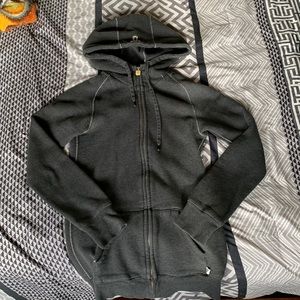 TNA zip up long body sweater